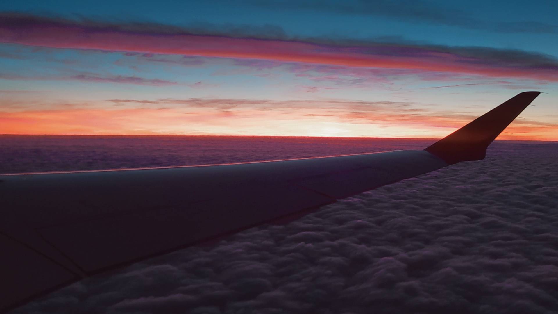 Precioso atardecer desde nuestro vuelo de vuelta.